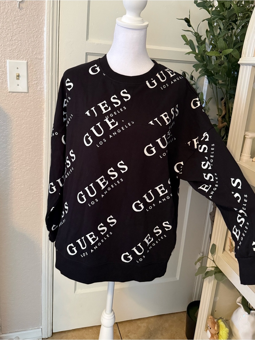 GUESS Black Crewneck Sweatshirt with All-Over White Logo
